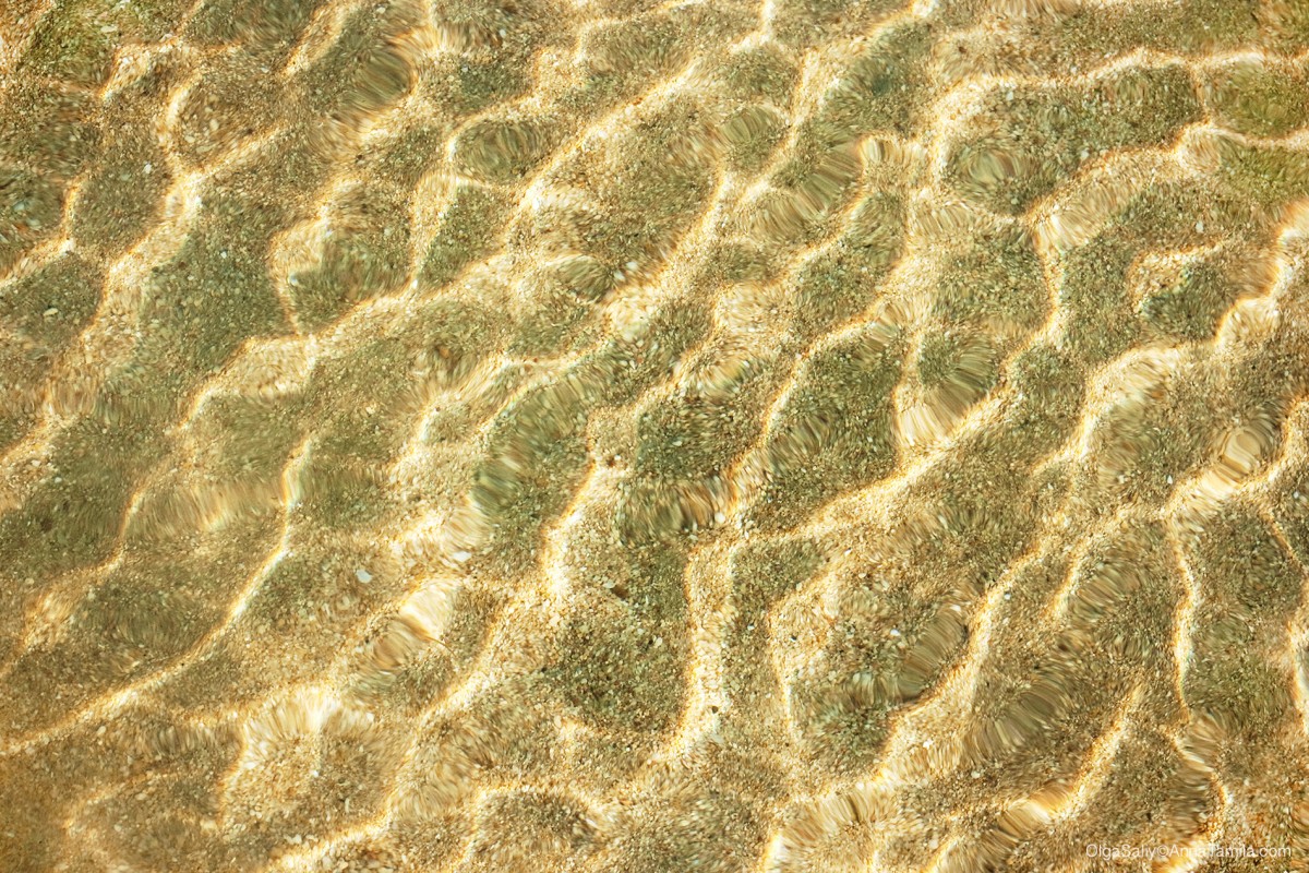 Beach sand bottom ripple of water waves