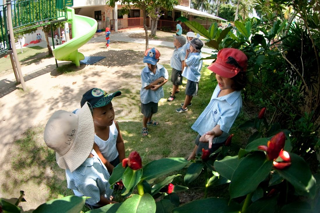 Boys in kindergarten in Thailand to discuss something important