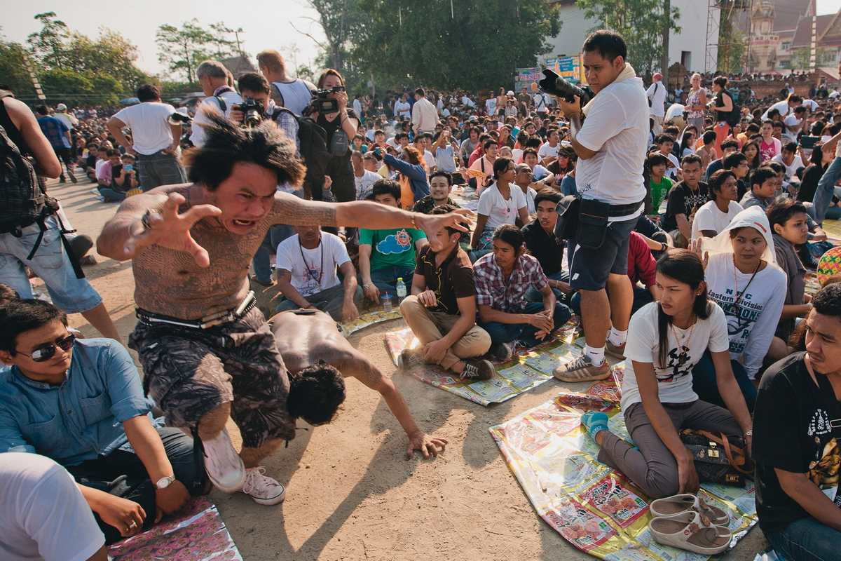 a man in a trance at the festival magic tattoos in Thailand