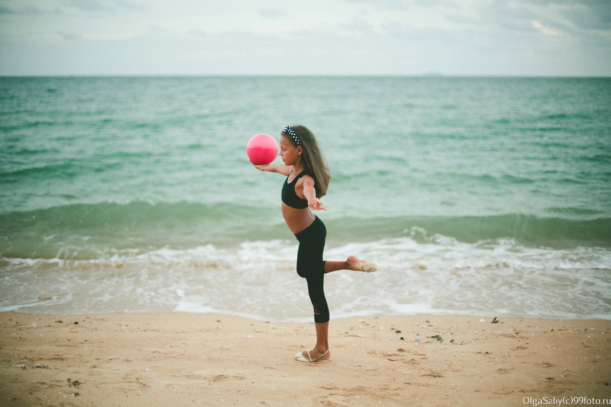 Girl with Ball on the beach