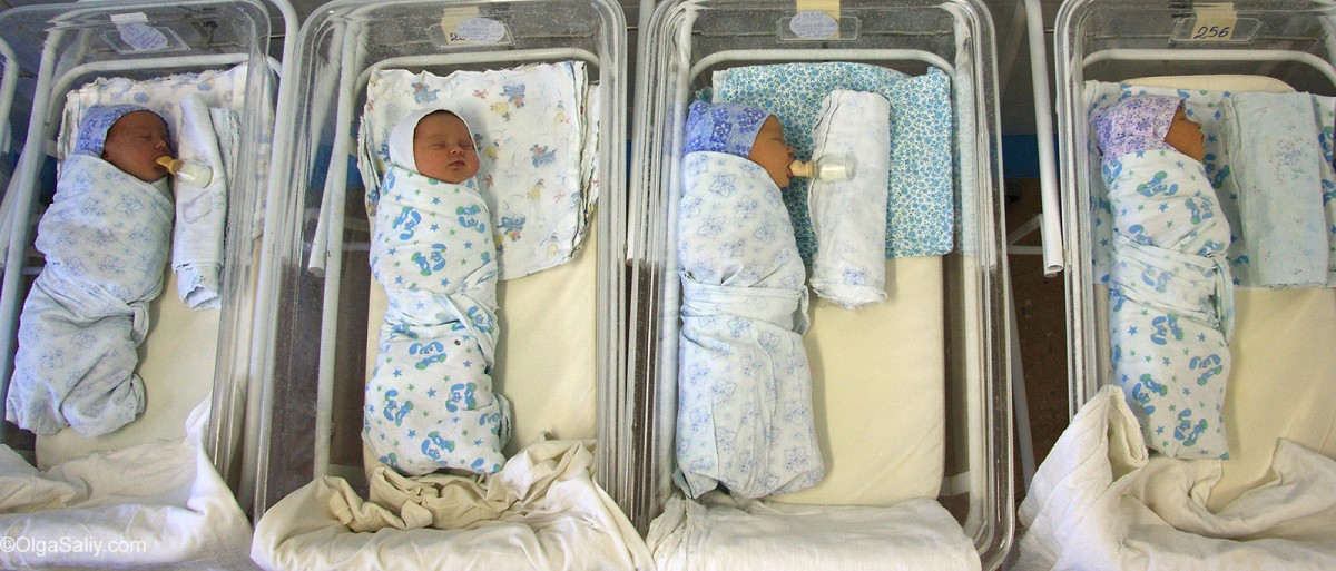 newborn babies in cribs hospital