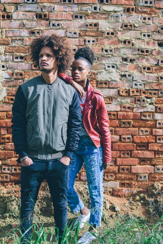 Young black teen couple. Dark skin, mixed race, voluminous african hair