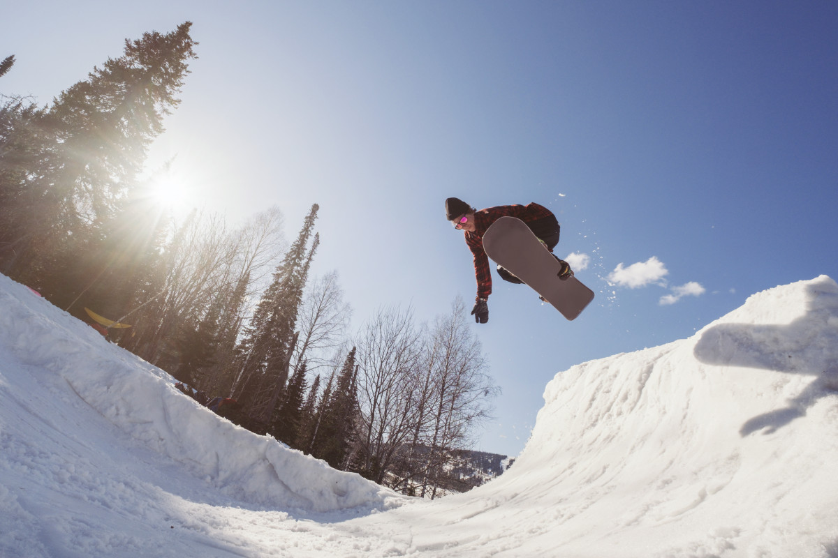 Jumping Snowboarder Photorgapher